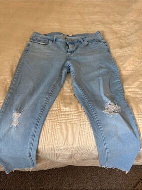 Levi 711 Light Blue Distressed Women’s Jeans